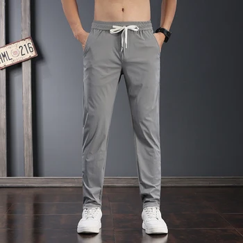 2023 Yaz Marka Yeni İnce Nefes Buz İpek Pantolon Moda Genç erkek Kore Tarzı Elastik belli Hafif Pantolon